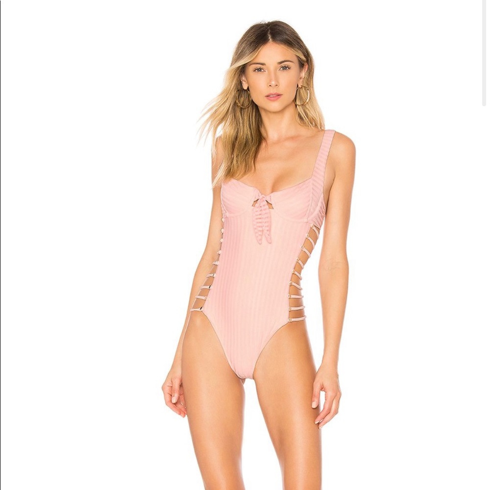 Blush striped swimsuit from Revolve/Tularosa